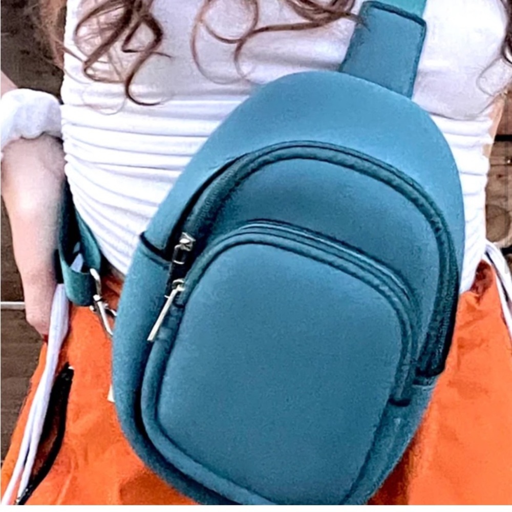 K Carroll Shelly Teal sling crossbody bag
